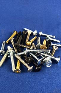 assortment of screws on a table